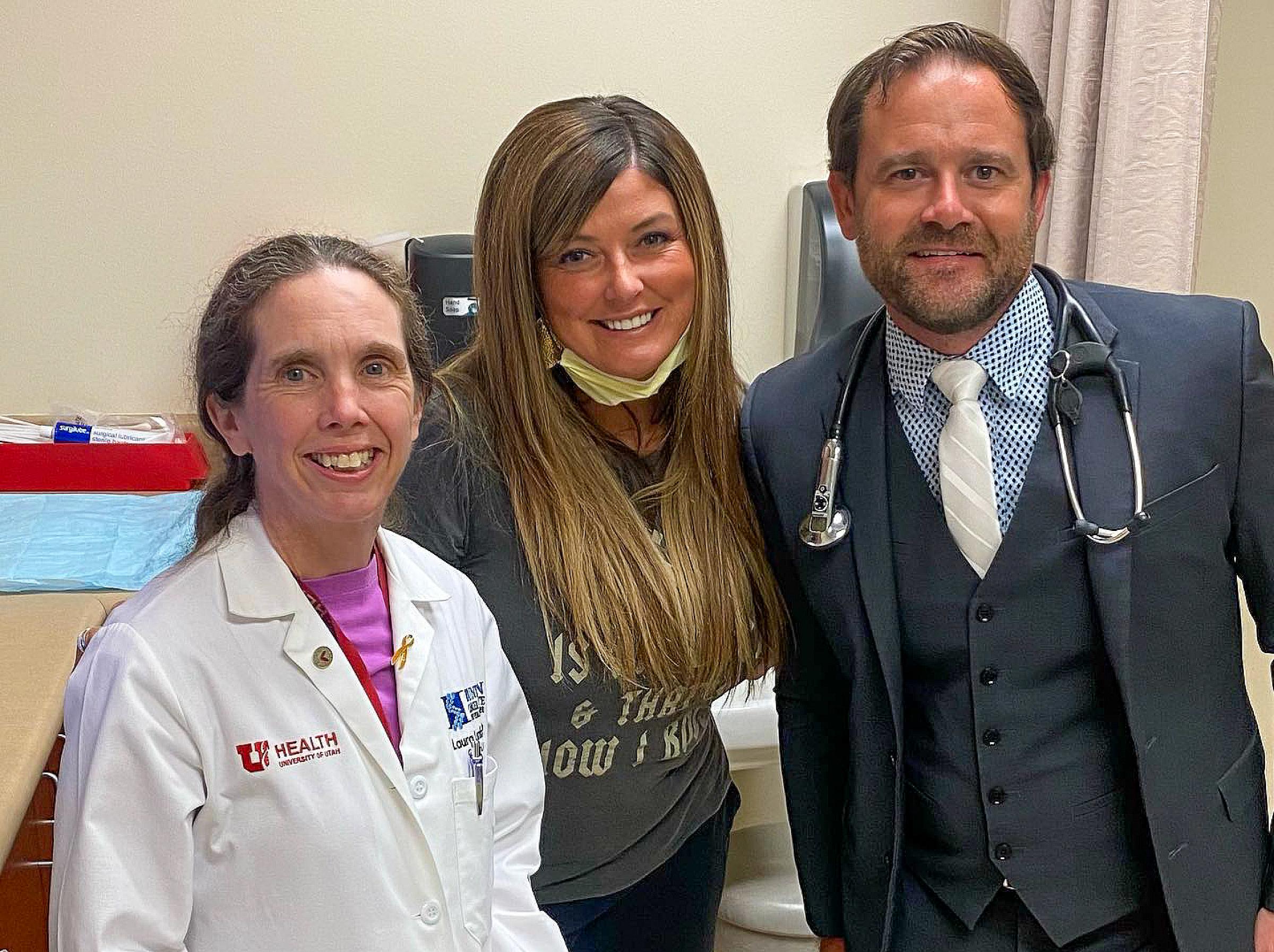 Amber with her "dream team:" Dr. Laura Lambert and Dr. Conan Kinsey at her most recent follow-up appointment.