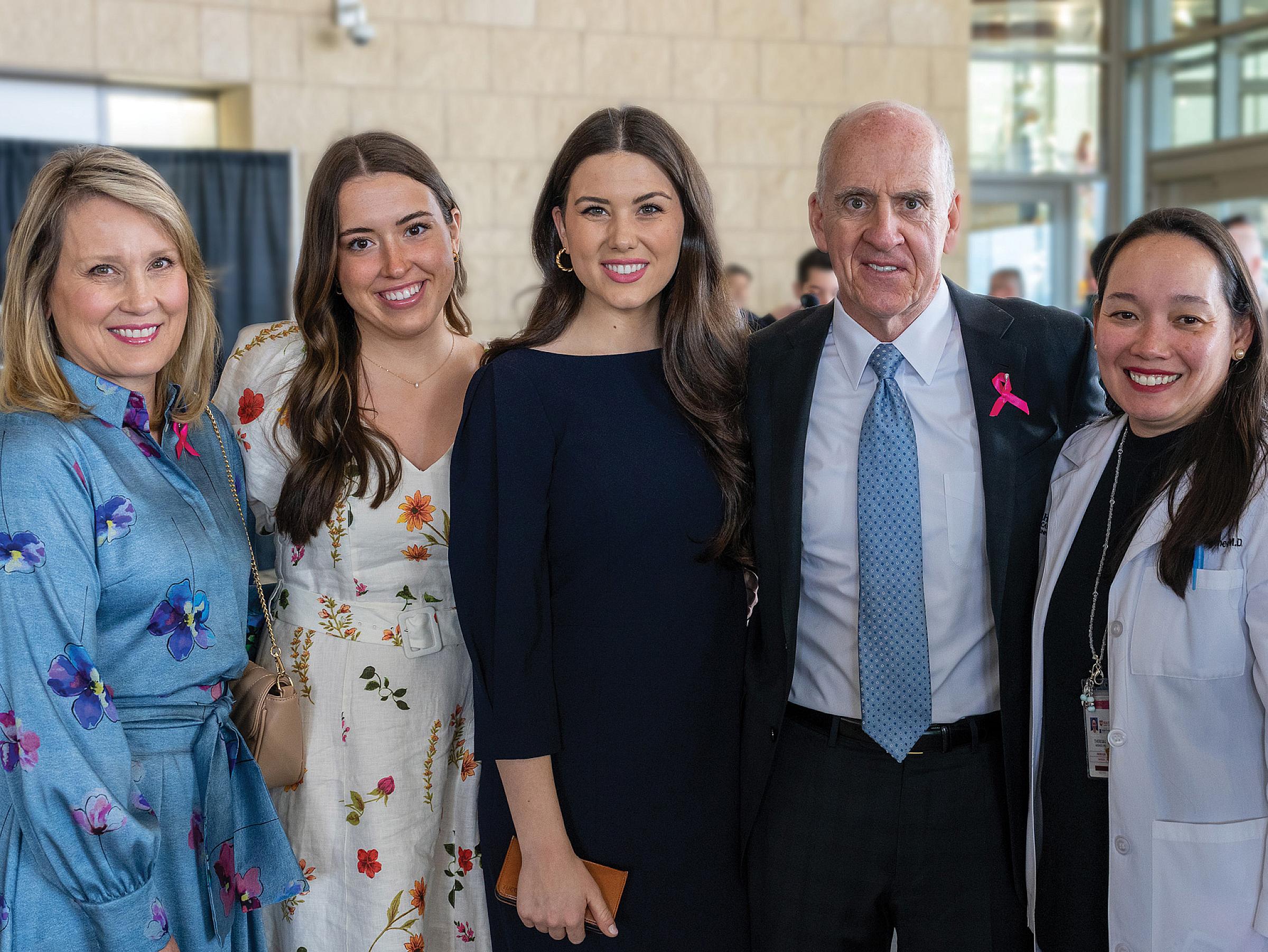 Kristen and Spencer Kirk, their daughters, and Theresa Werner, MD, at the dedication of the Kathryn F. Kirk Center