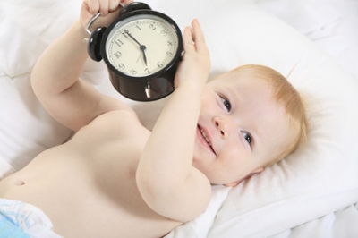 Child Holding Clock