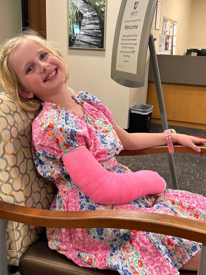 Lila Williams, pediatric sports medicine patient with a pink cast on her broken arm