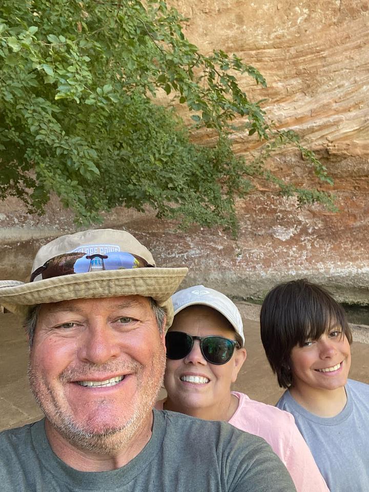 Randy Wolley hiking with family