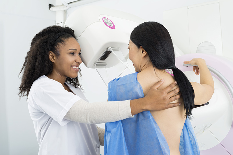 Woman getting ready for a mammography