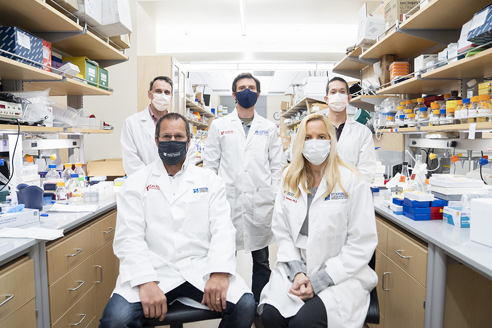 Group photo of Doug Grossman, MD, PhD, Robert Judson-Torres, PhD, David Lum, PhD, Matthew VanBrocklin, PhD, Sheri Holmen, PhD