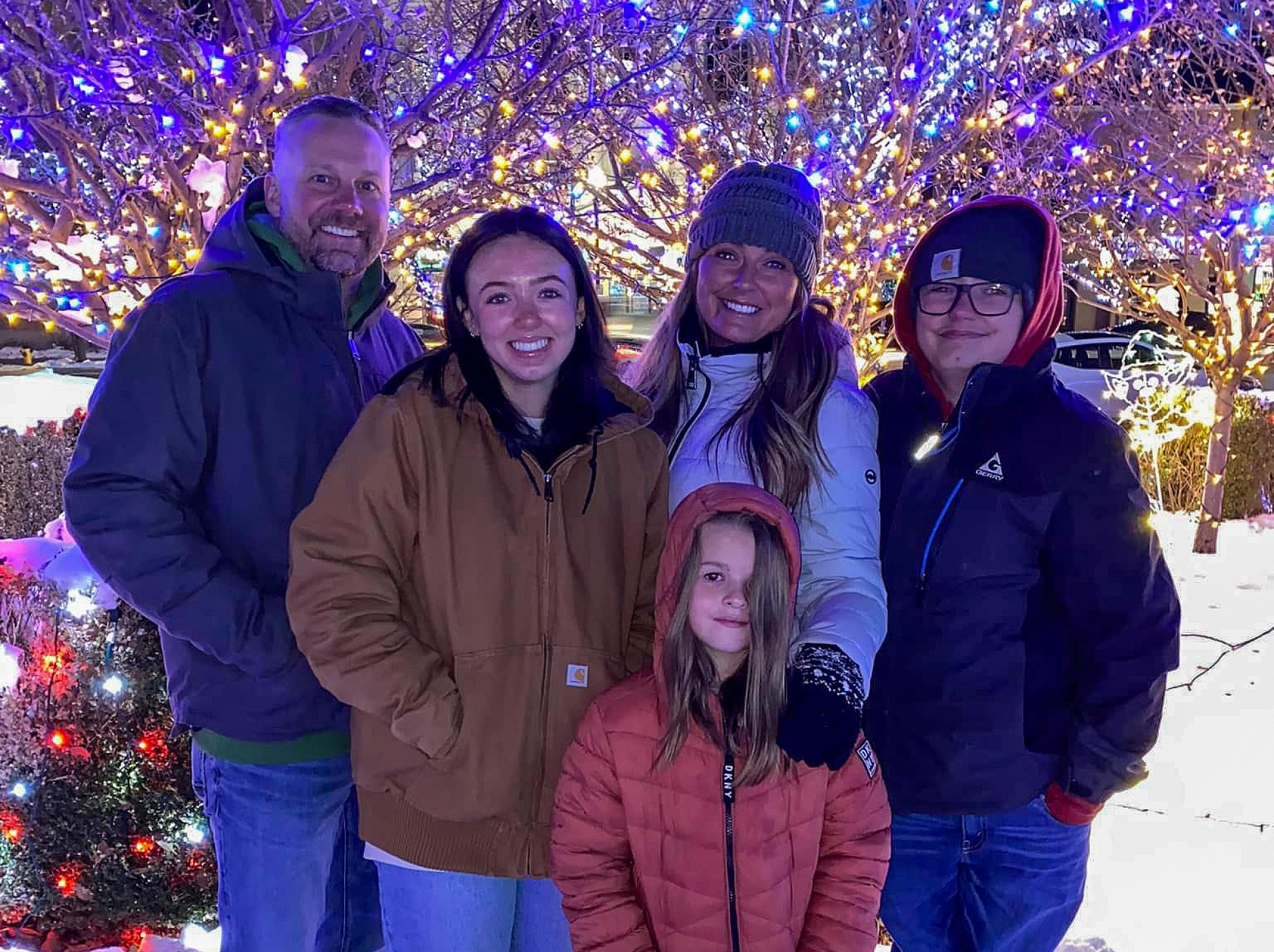 Amber and her family enjoying the Ogden Christmas Village