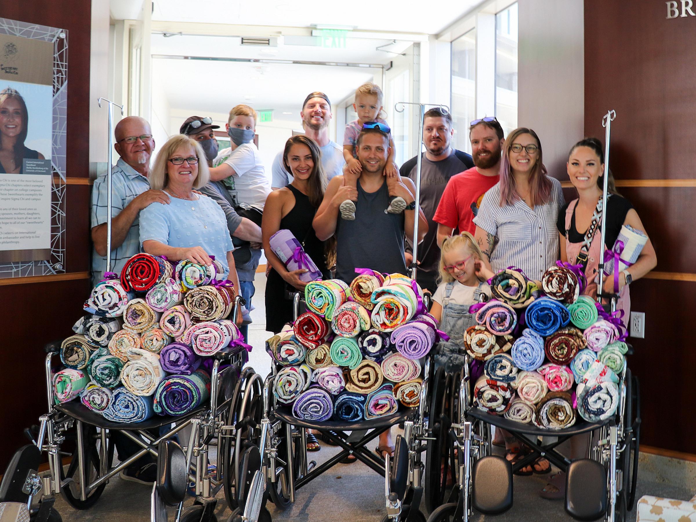 Natalie's family delivering quilts to Huntsman Cancer Institute