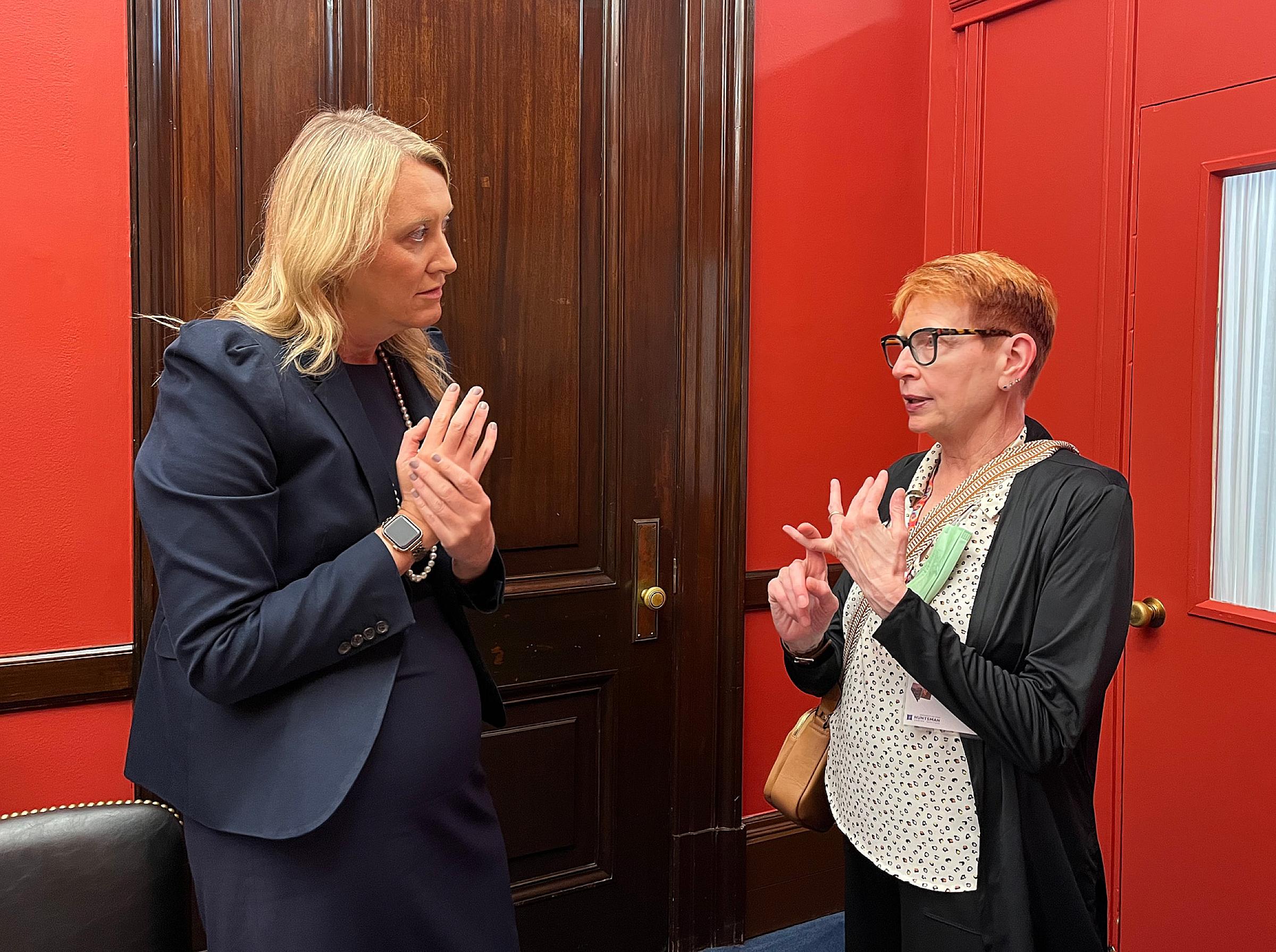 Diana Wiig, former Sweetwater Regional Cancer Center patient, converses with Senator Lummis's (WY) legislative assistant Linnea Melbye.