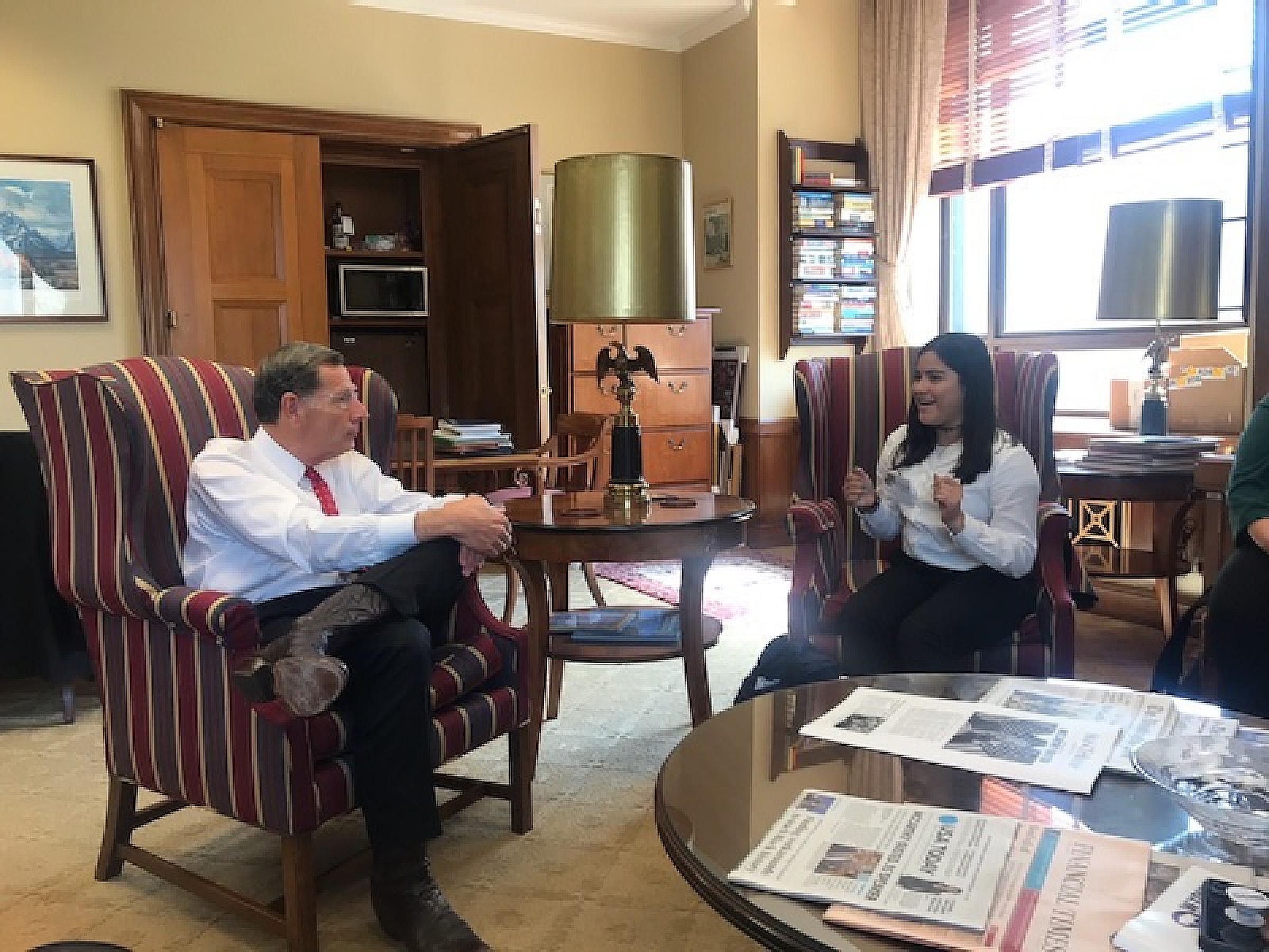 Fernanda Costilla, student researcher for Path Makers Scholars Program, discusses her training and research with Senator John Barrasso (WY).