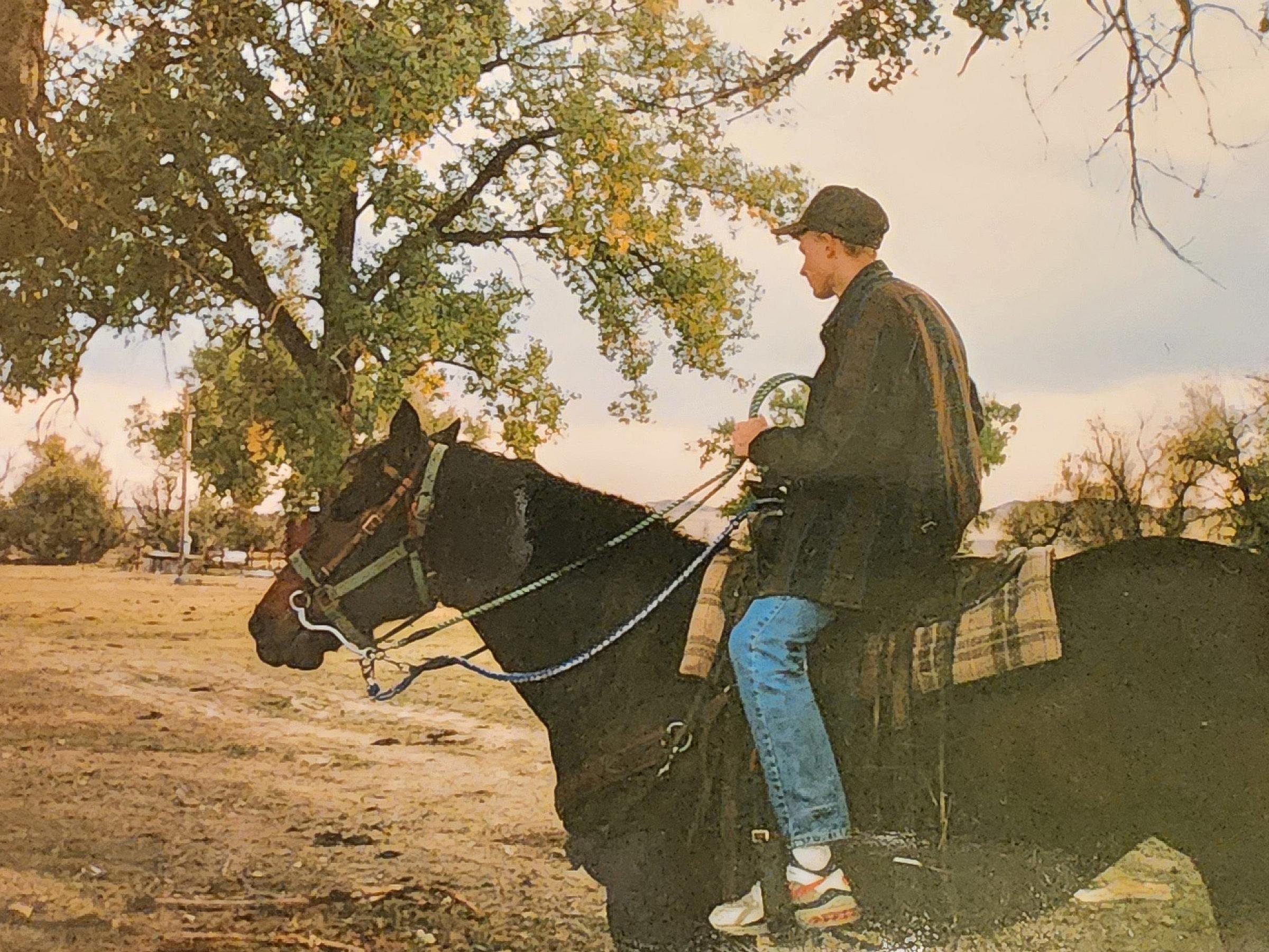 Jakob Jensen riding a horse.