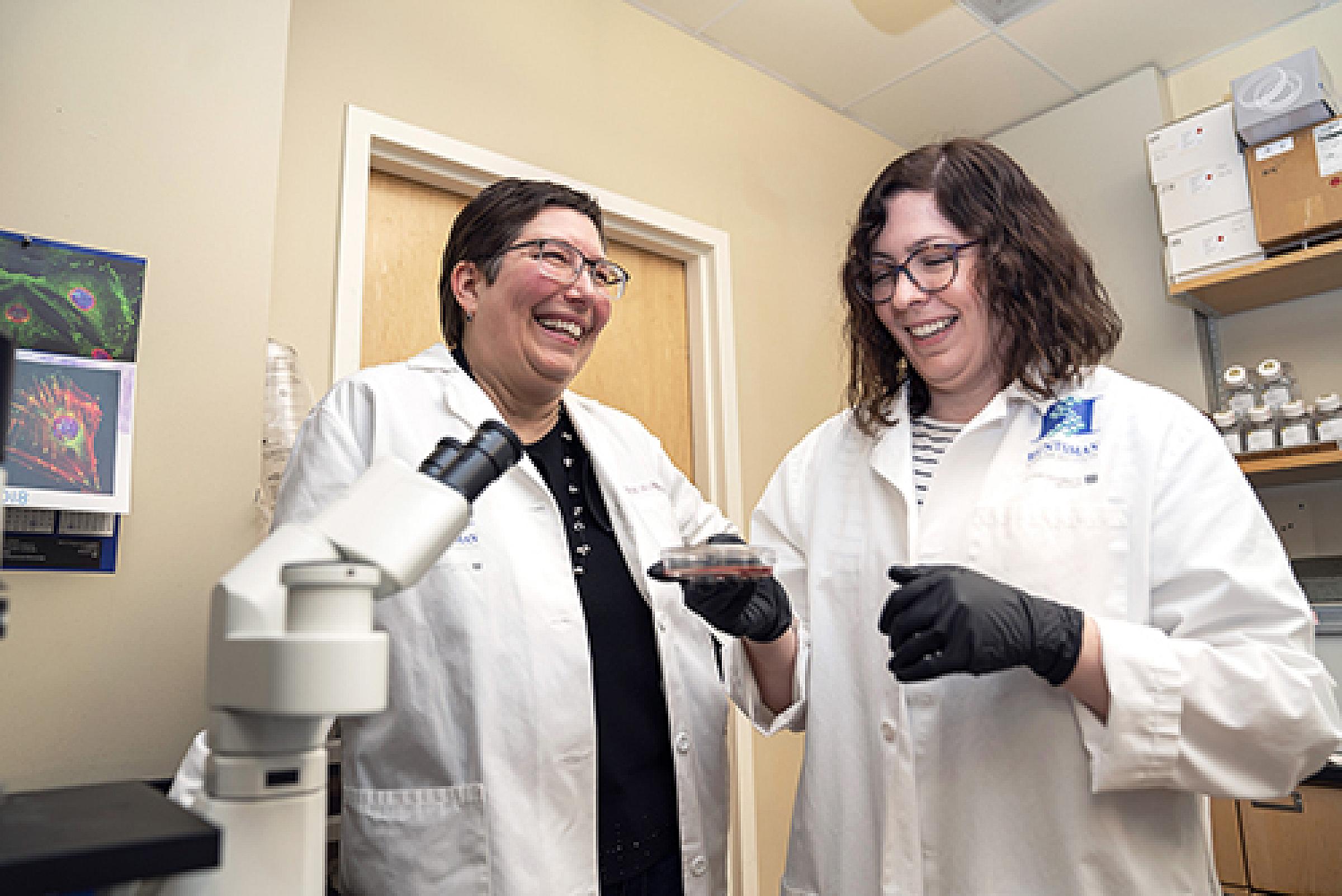 Katie Ullman, PhD and Dollie LaJoie in lab