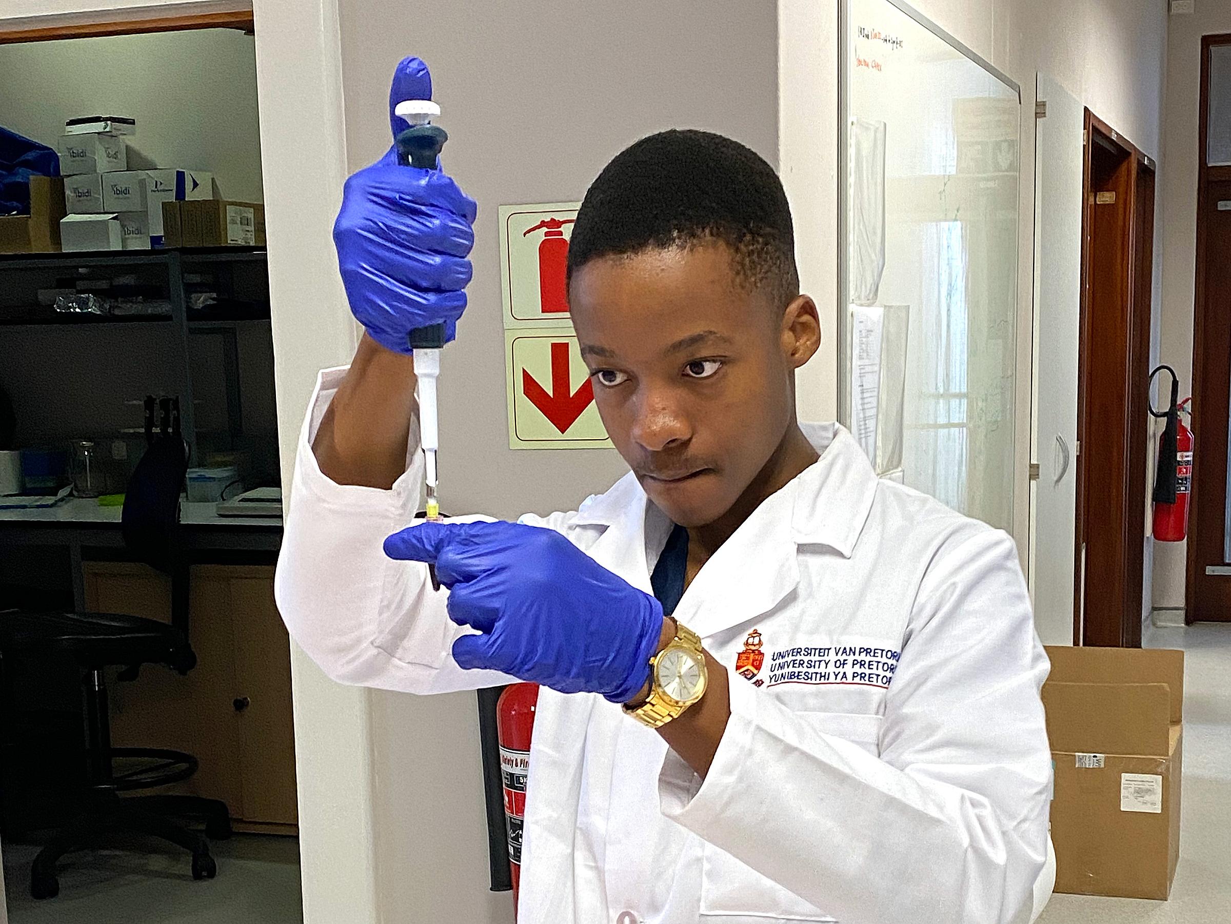 PMSA student practices using a pipette