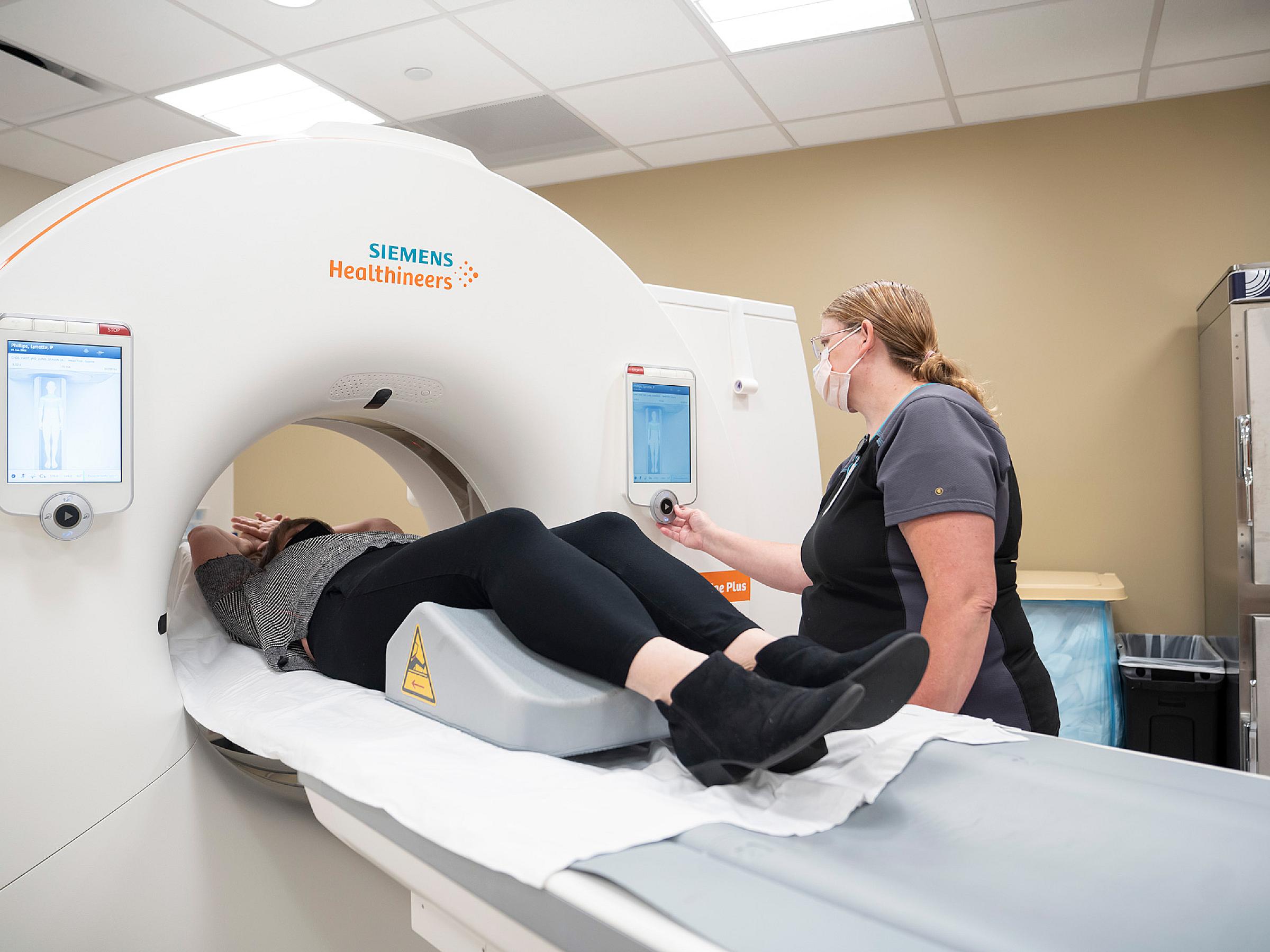 Patient undergoes CT scan for lung cancer screening.