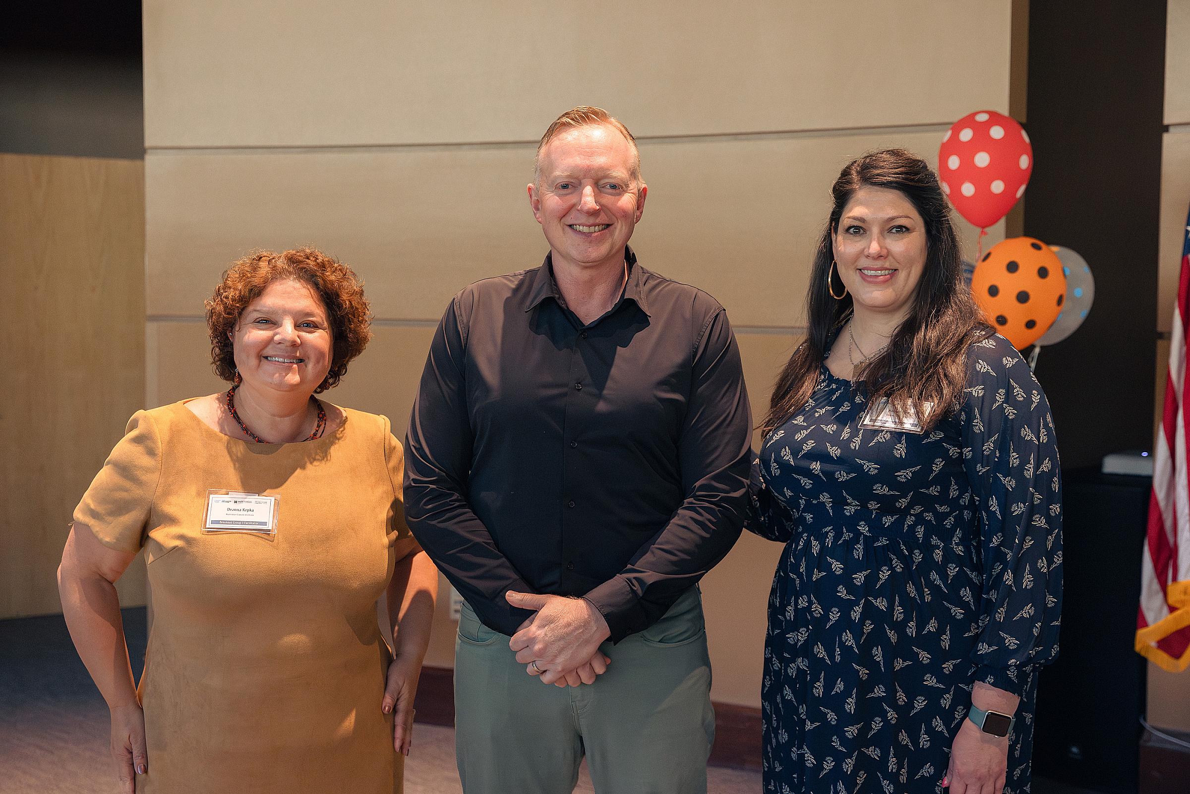 Oropharyngeal cancer survivor, Mike West (center), poses with Coalition director Deanna Kepka, PhD, MPH (left) and ACS Senior Program Manager for HPV in the Rocky Mountain Area, Hannah Nein (right).