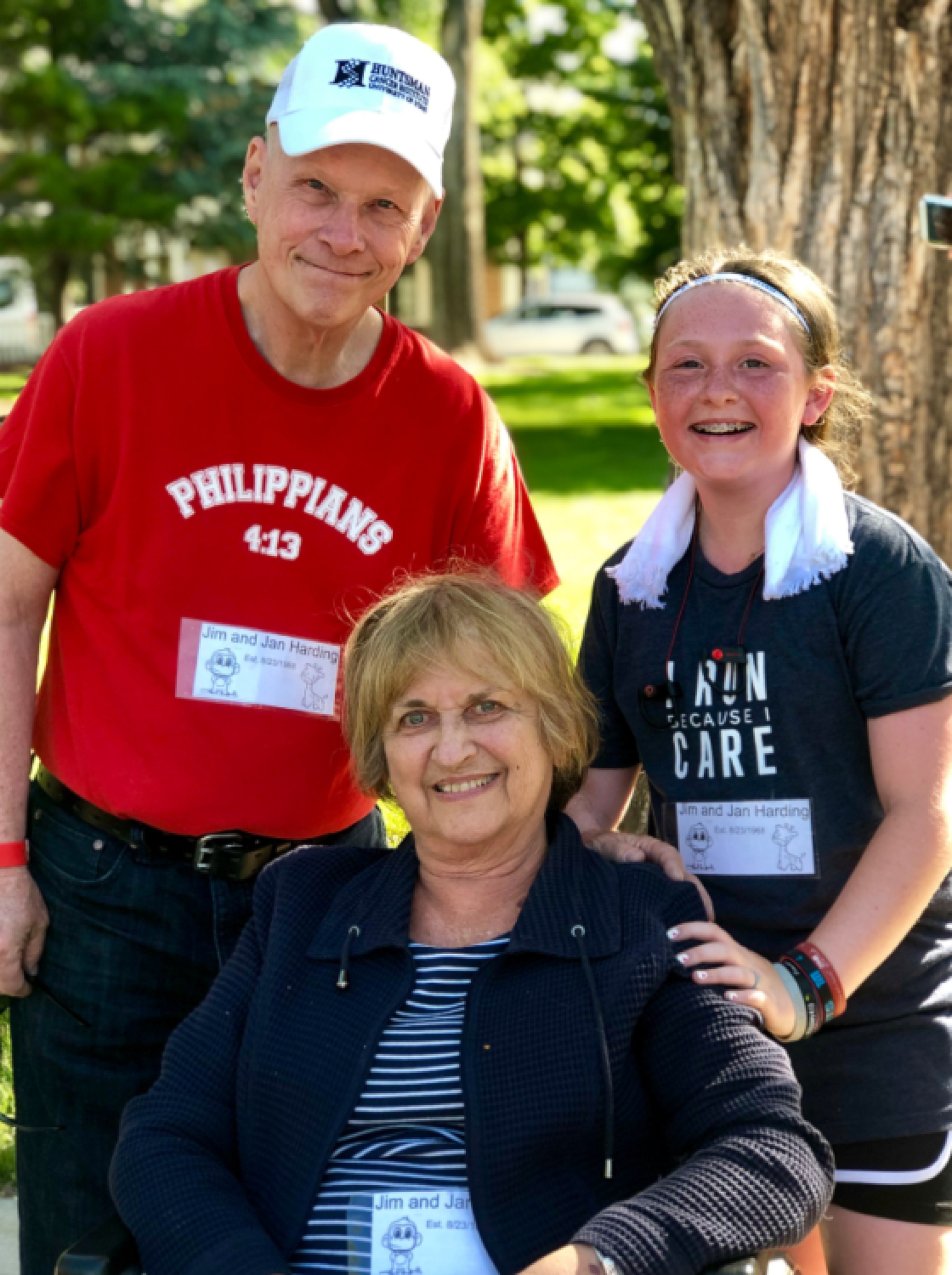 Allee Curby Outside with Elderly Couple Group Photo