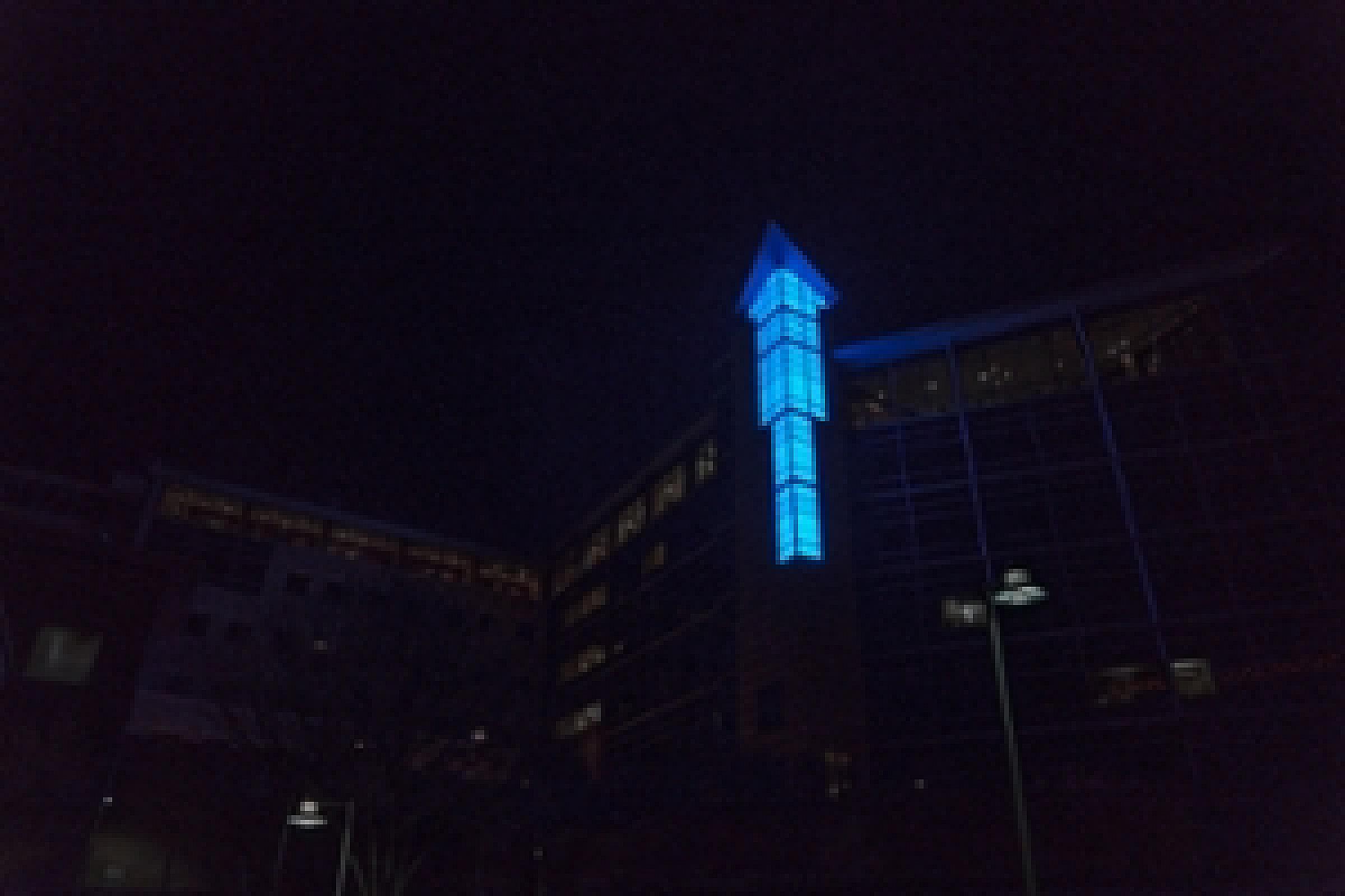 Beacon lit with blue light at night