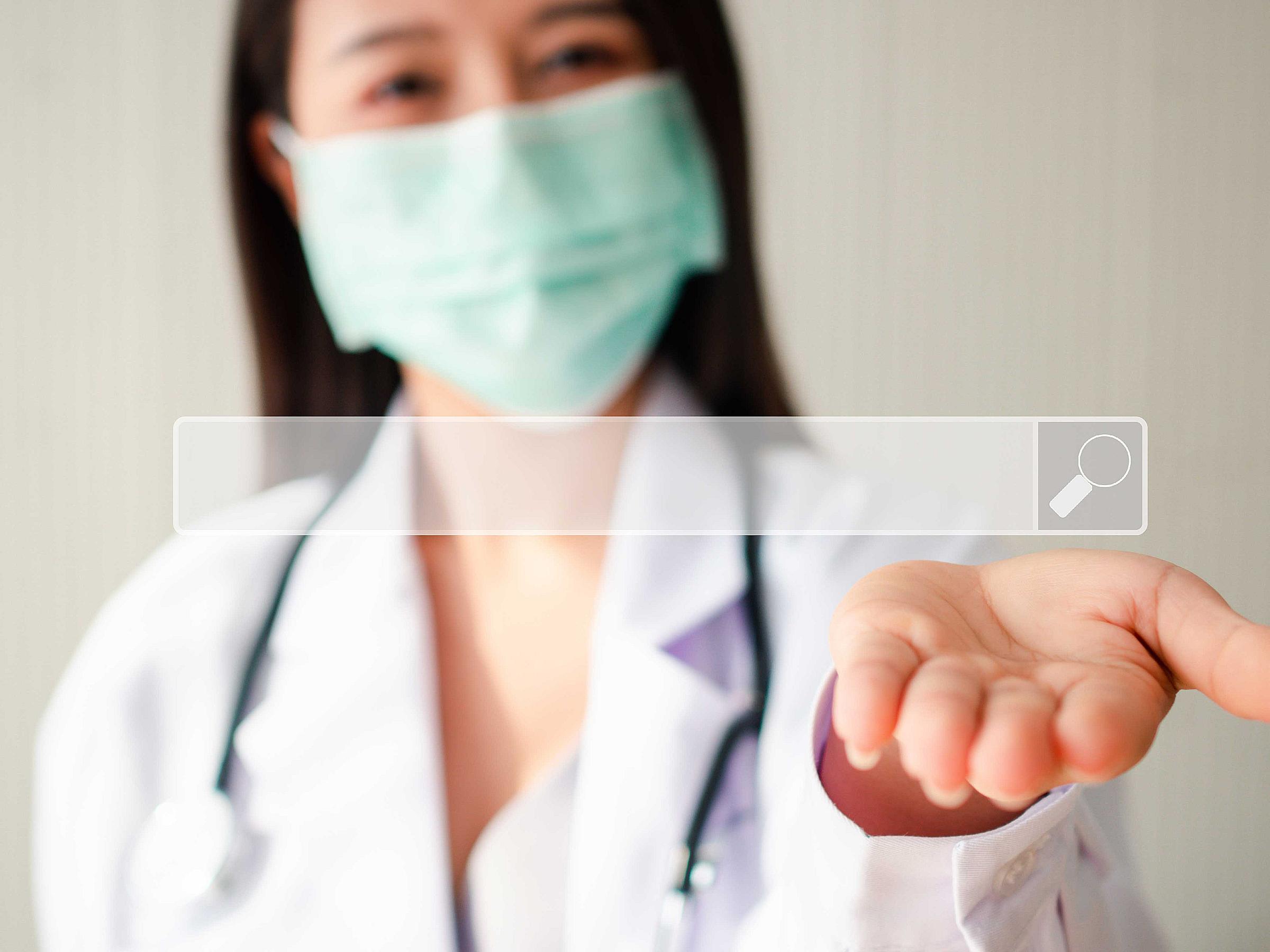 Doctor Google Search Bar in front of Woman with Mask
