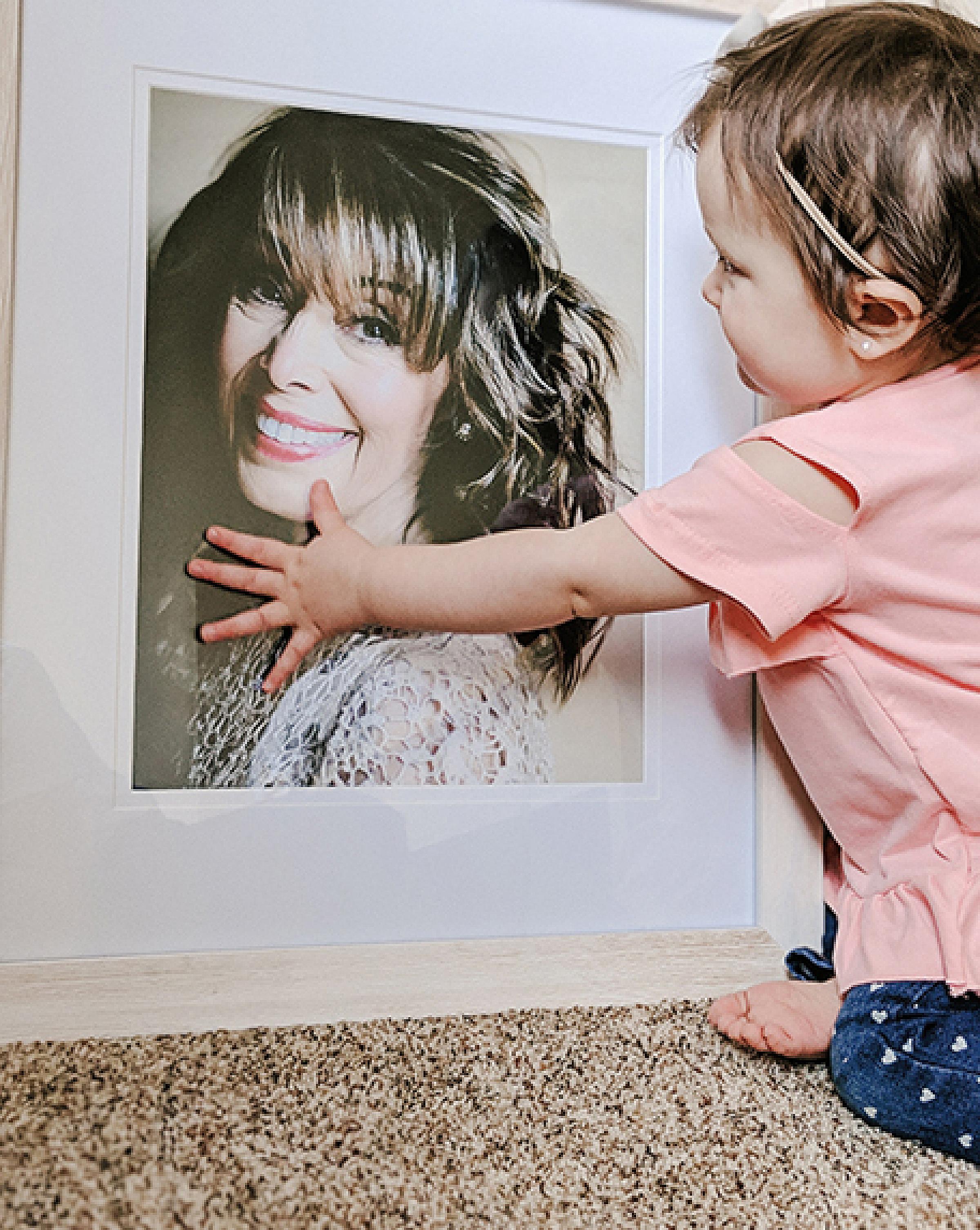Jackson Moore with a picture of her grandmother, Lorraine