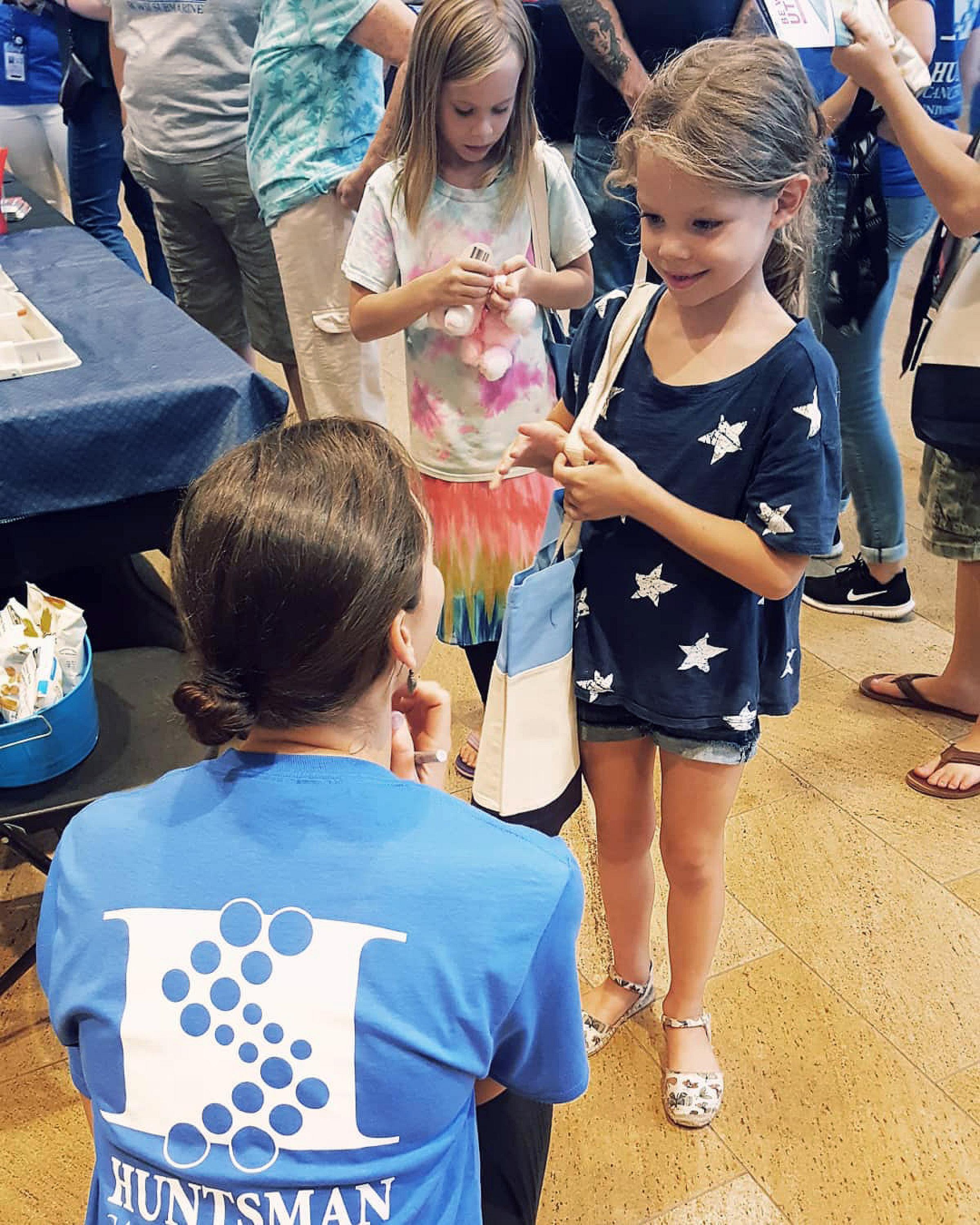Young girl at the 2018 Community Open House hosted by Be Well Utah