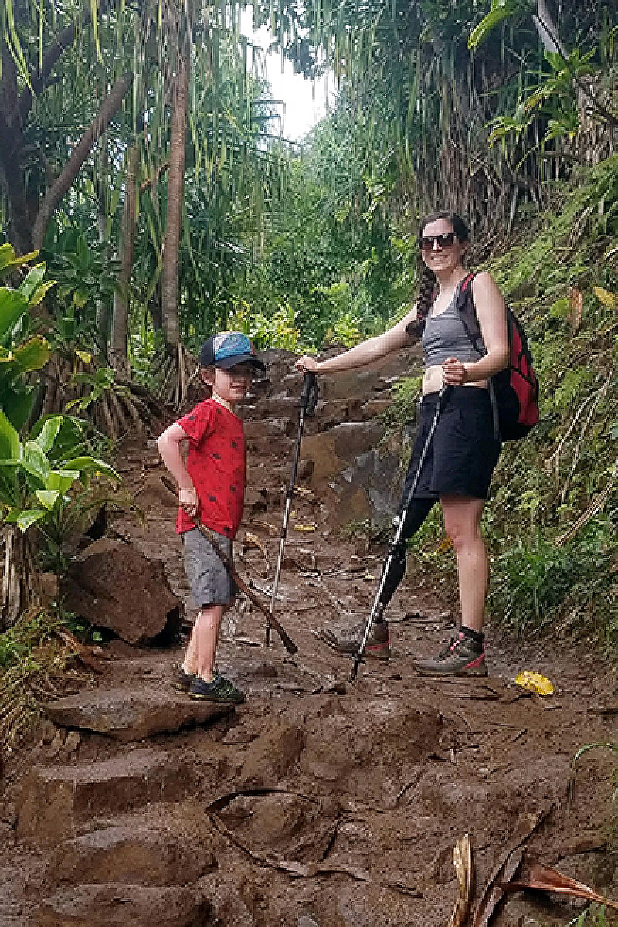 Jenny and her son hiking on a recent trip to Hawaii