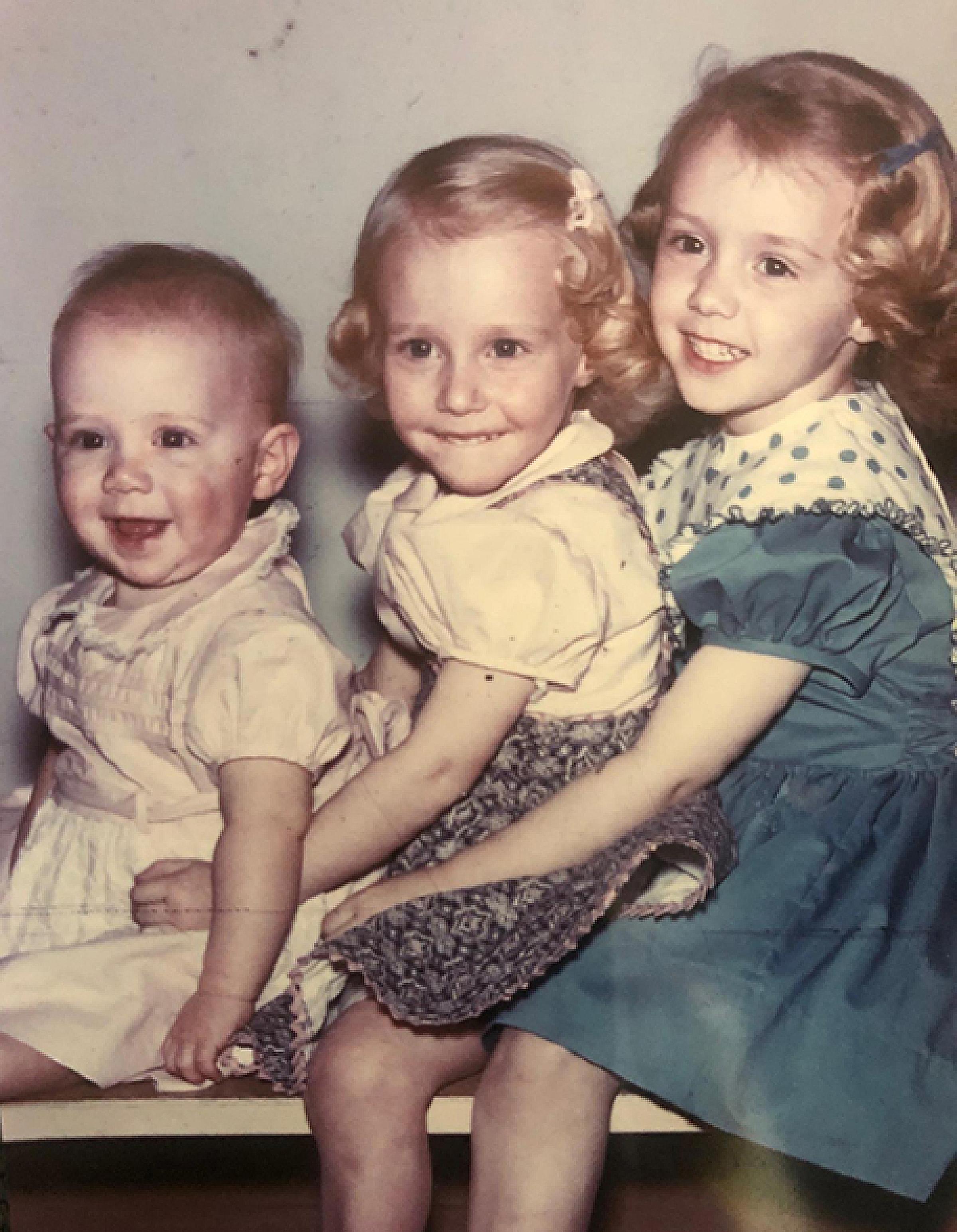 Mary, in the middle, and two of her sisters