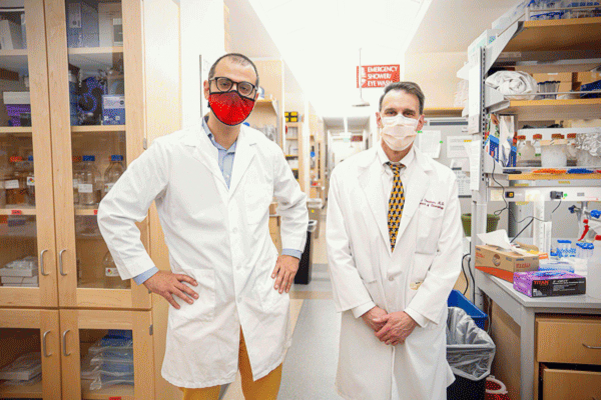 Benjamin Sanchez-Terrones, PhD and Doug Grossman, MD, PhD standing in a lab