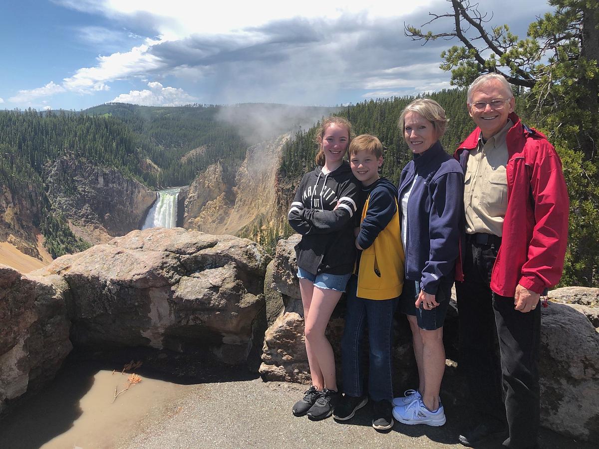 Lowry Bushnell, his wife, and two grandchildren near the Grand Canyon of the Yellowstone