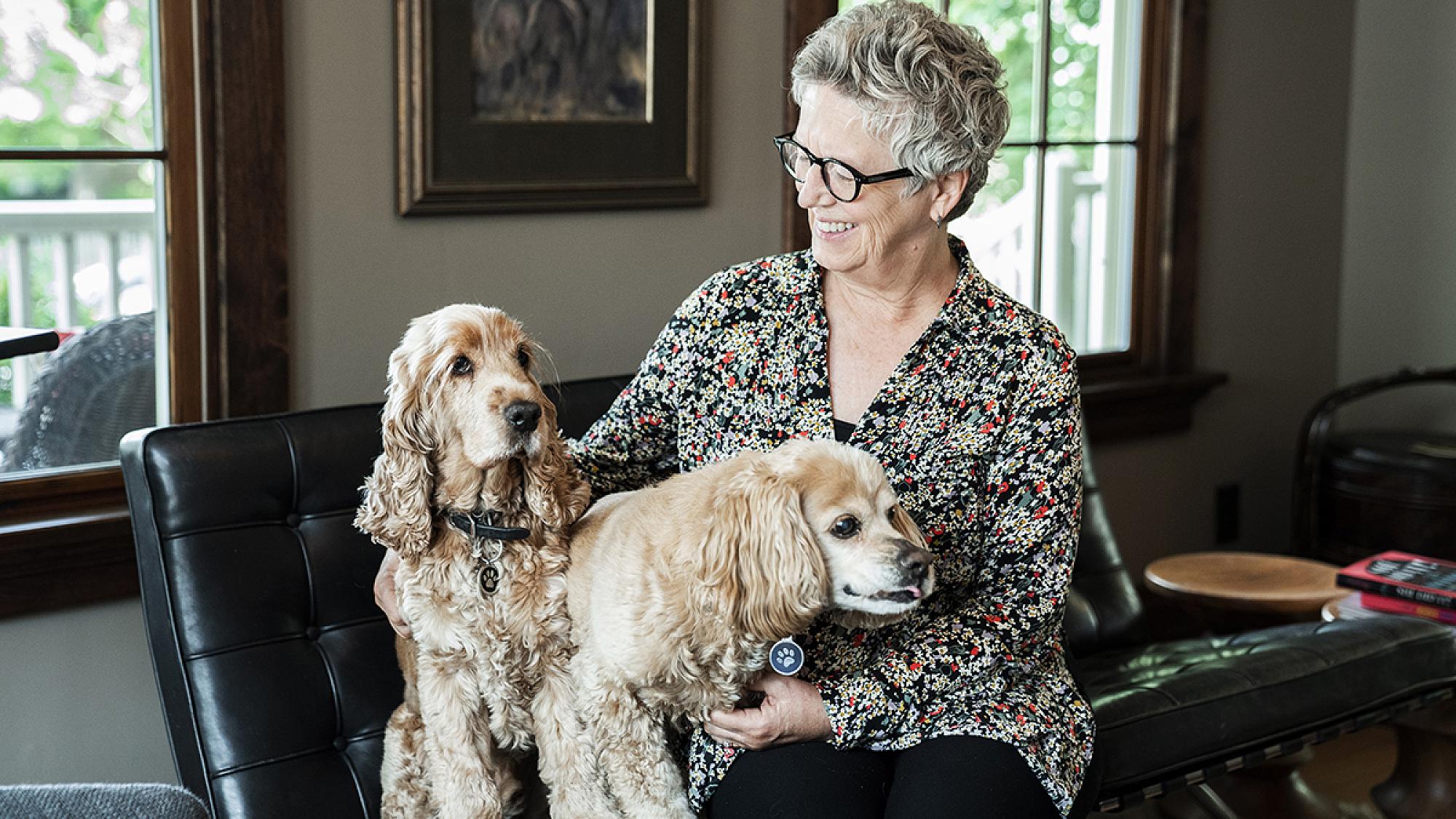 Terri Jones with her two dogs at home