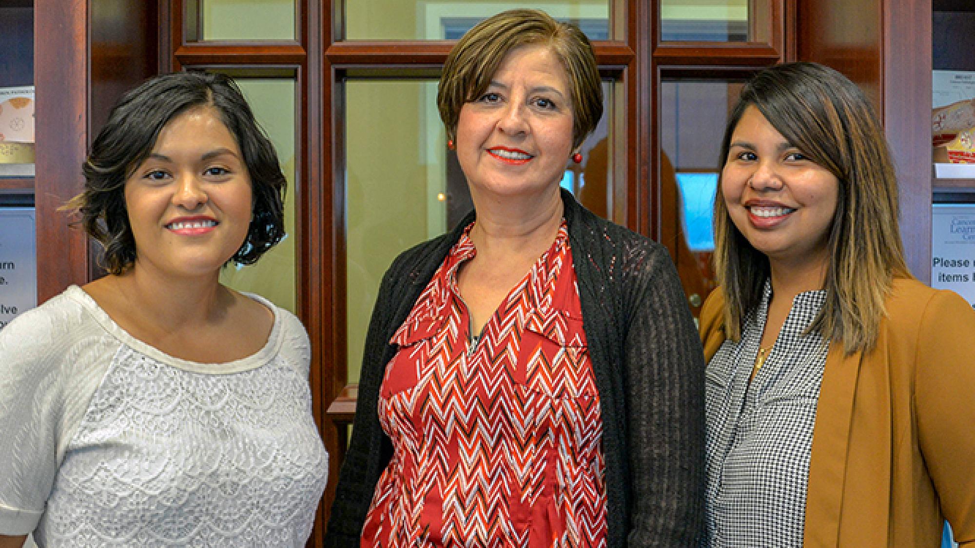 Anna Martinez, Liliana Mulato, and Guadalupe Tovar standing together