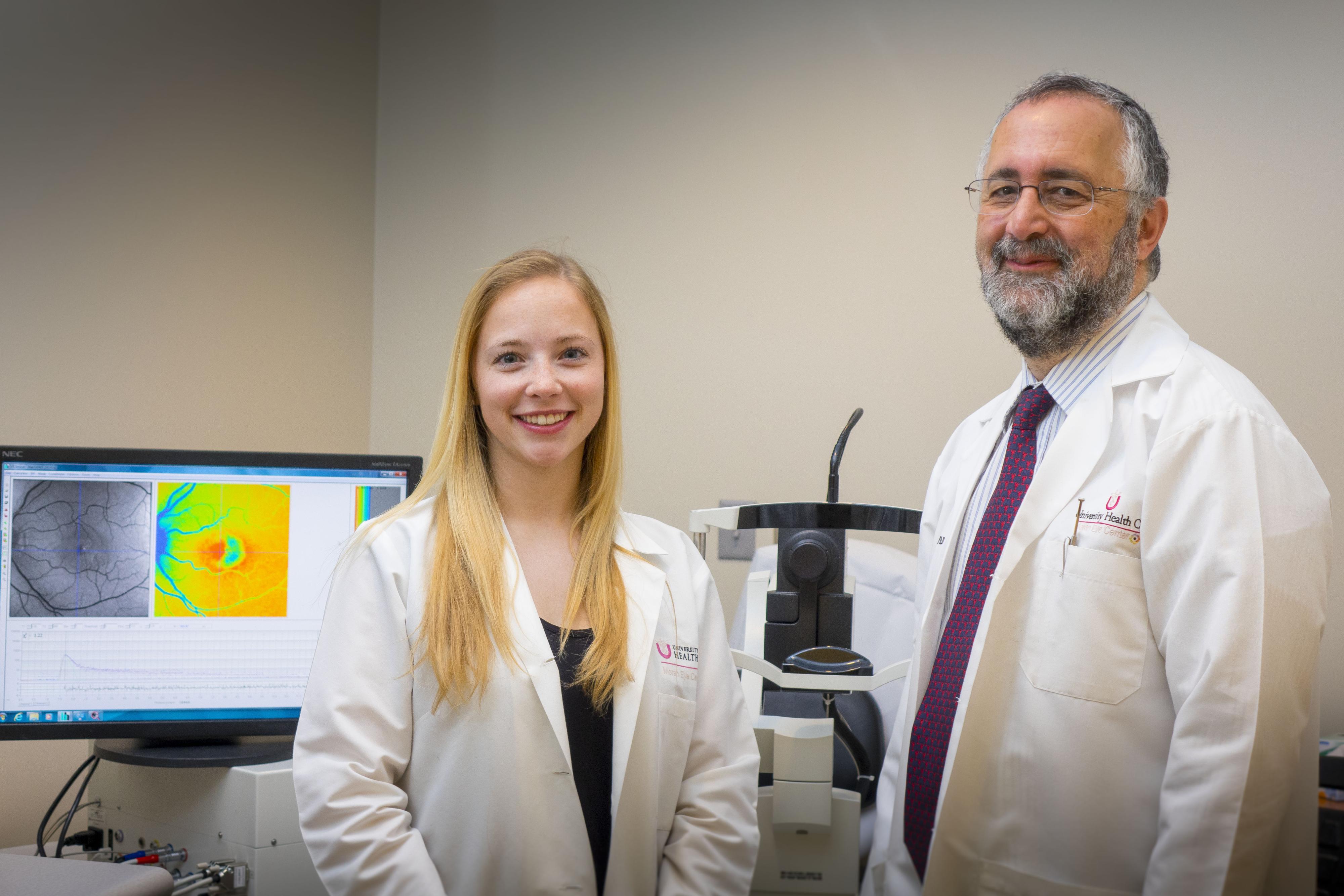 Moran’s Lydia Sauer, MD, and Paul S. Bernstein, MD, PhD, work with a cutting-edge, non-invasive imaging tool known as FLIO.