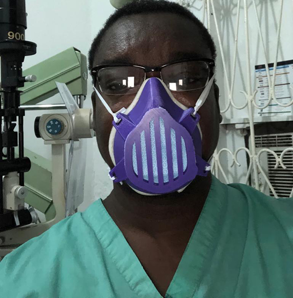 Dr. Pierre Luc Dupuy in Haiti wears the PPE created by Moran and Salt Lake City volunteers.