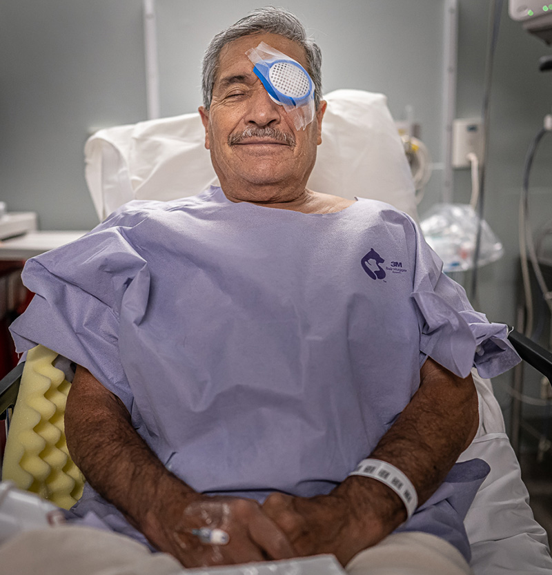 A patient rests following cataract surgery at a recent Operation Sight Day, an annual charitable surgery event at the Moran Eye Center funded by donors.