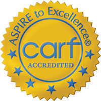 Aspire to Excellence CARF Accredited Gold Seal with Blue Stars