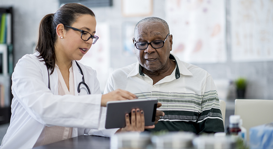 doctor speaking with patient