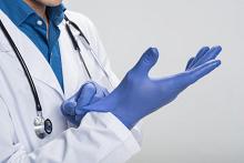 Surgeon gloves on hands
