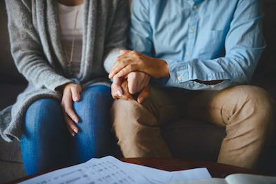 Man and Woman Holding Hands