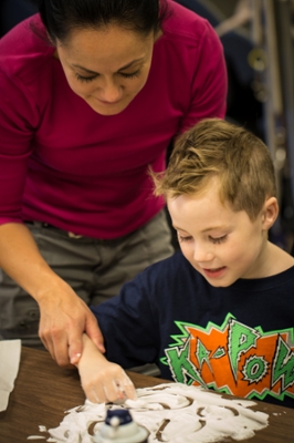 Mom Helps Child Write