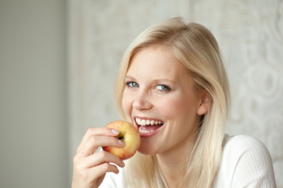 Woman Eating an Apple