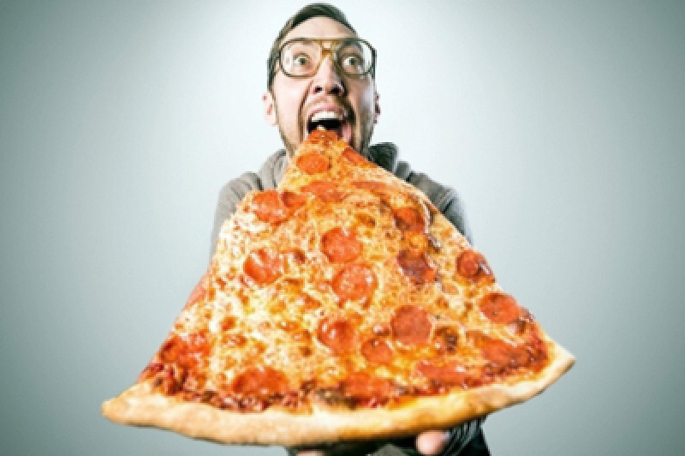 Man eating pizza