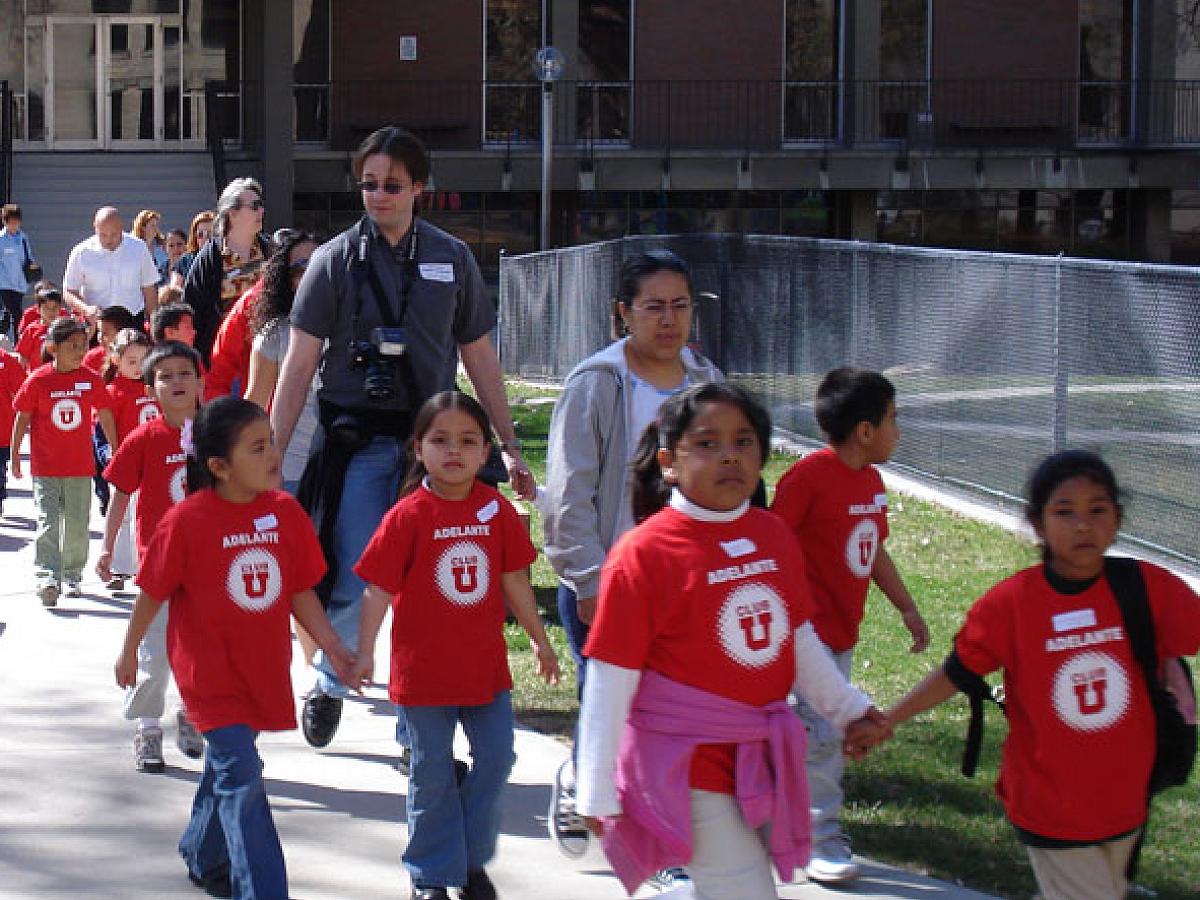 University Neighborhood Partners kids in red shirts
