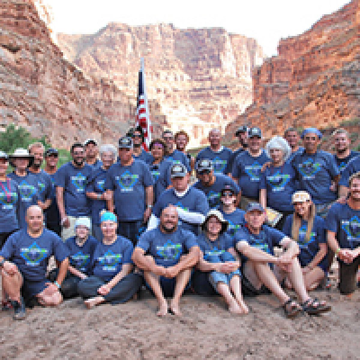 Adult River Retreat Participants Pose Together in Cataract Canyon