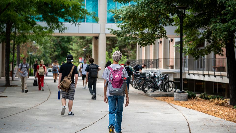 Students walking around University of Utah campus