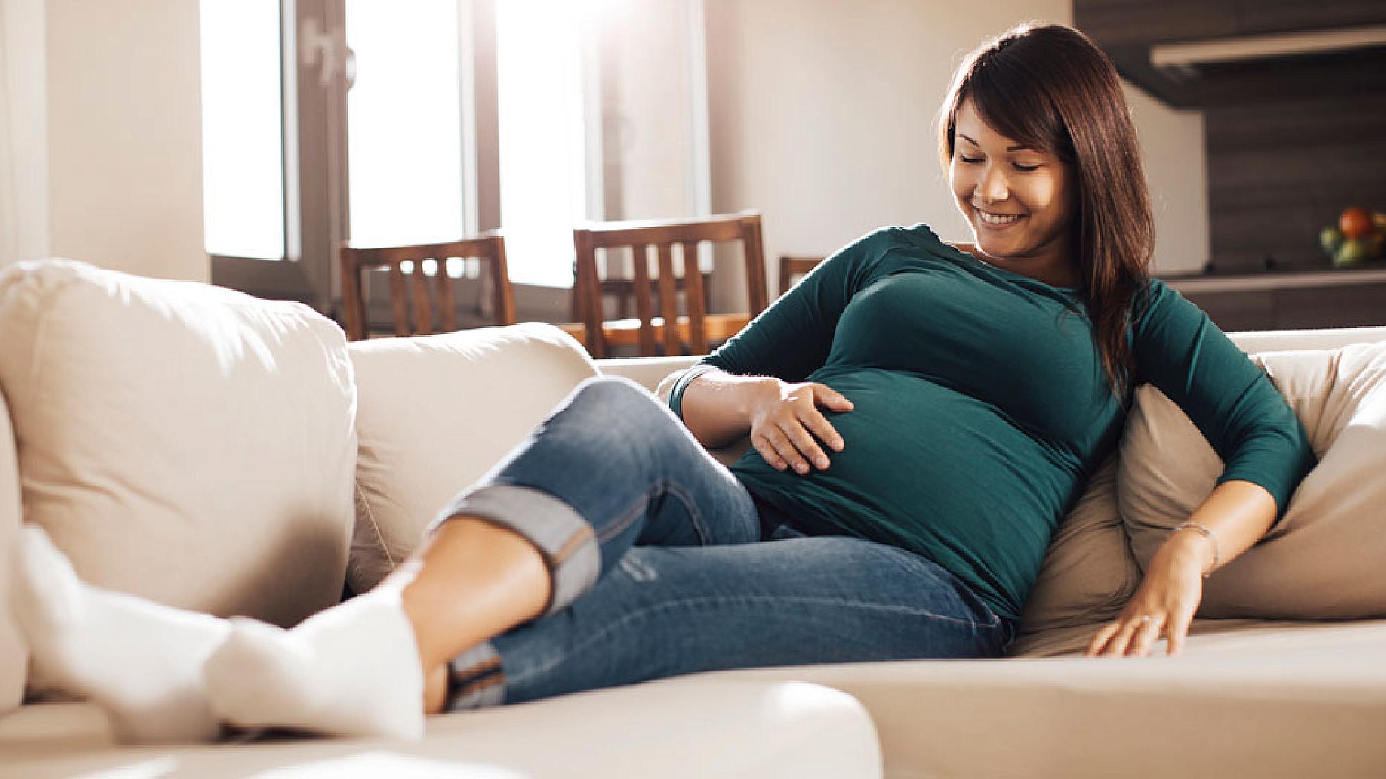 Pregnant Woman on Couch
